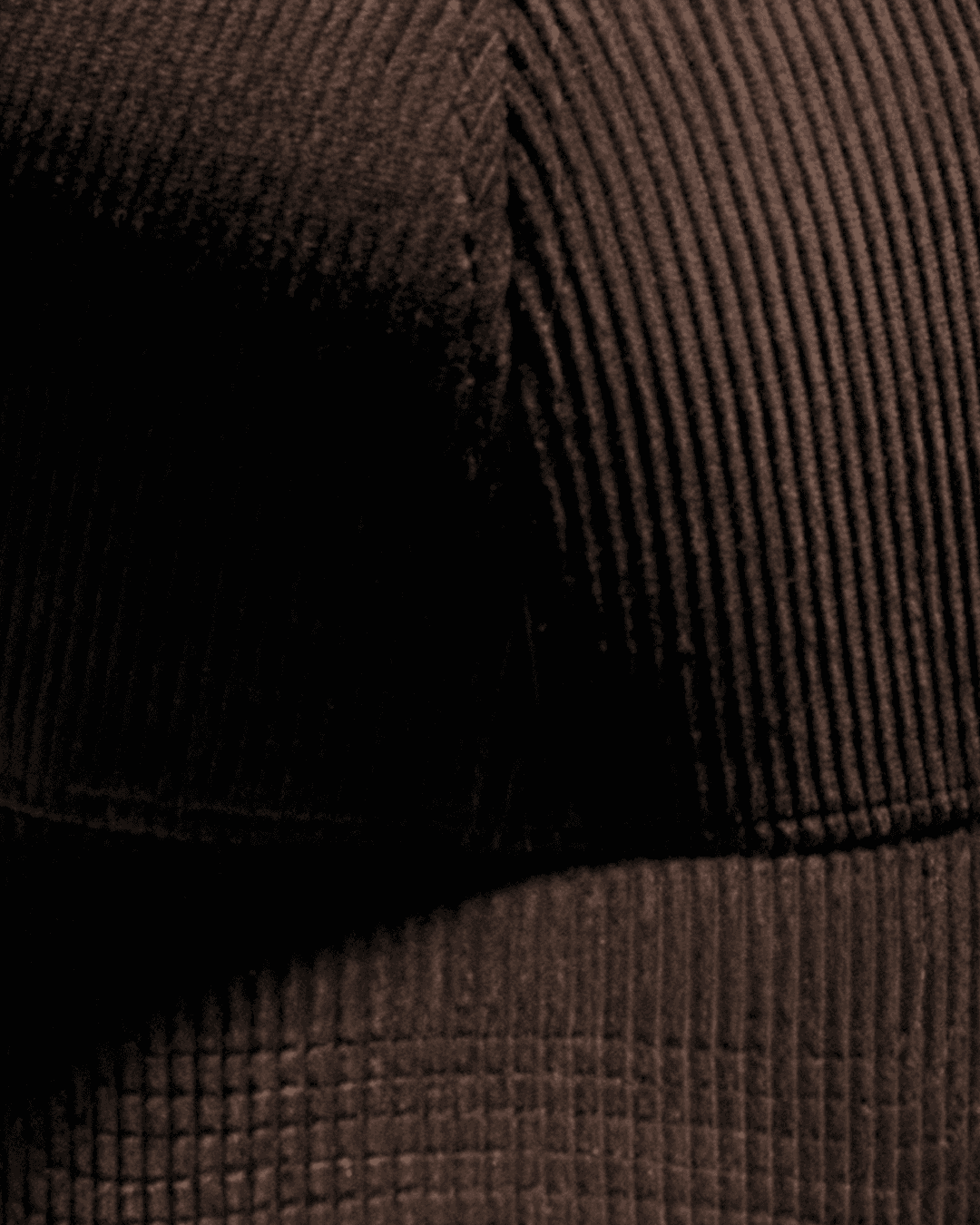 Detailed view of brown corduroy cap from varsity headwear