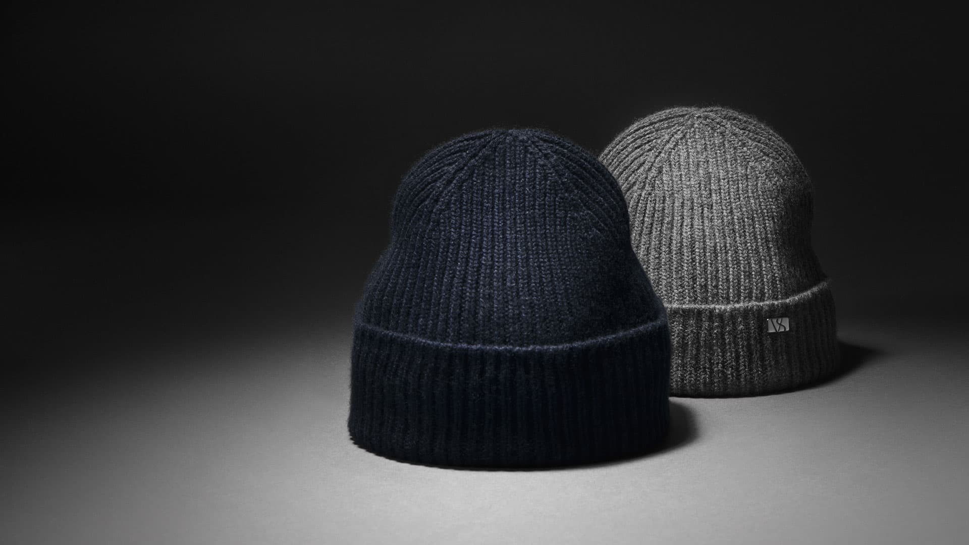Front view of grey and navy beanie in cashmere merino wool blend from varsity headwear
